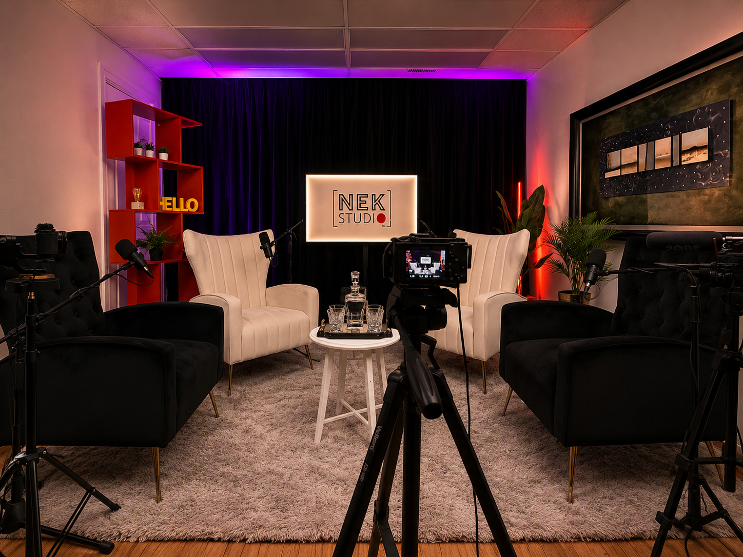 Configuration multicaméra de la Signature Room de NEK STUDIO pour balados (podcasts), tables rondes et productions vidéo professionnelles jusqu'à 4 participants.